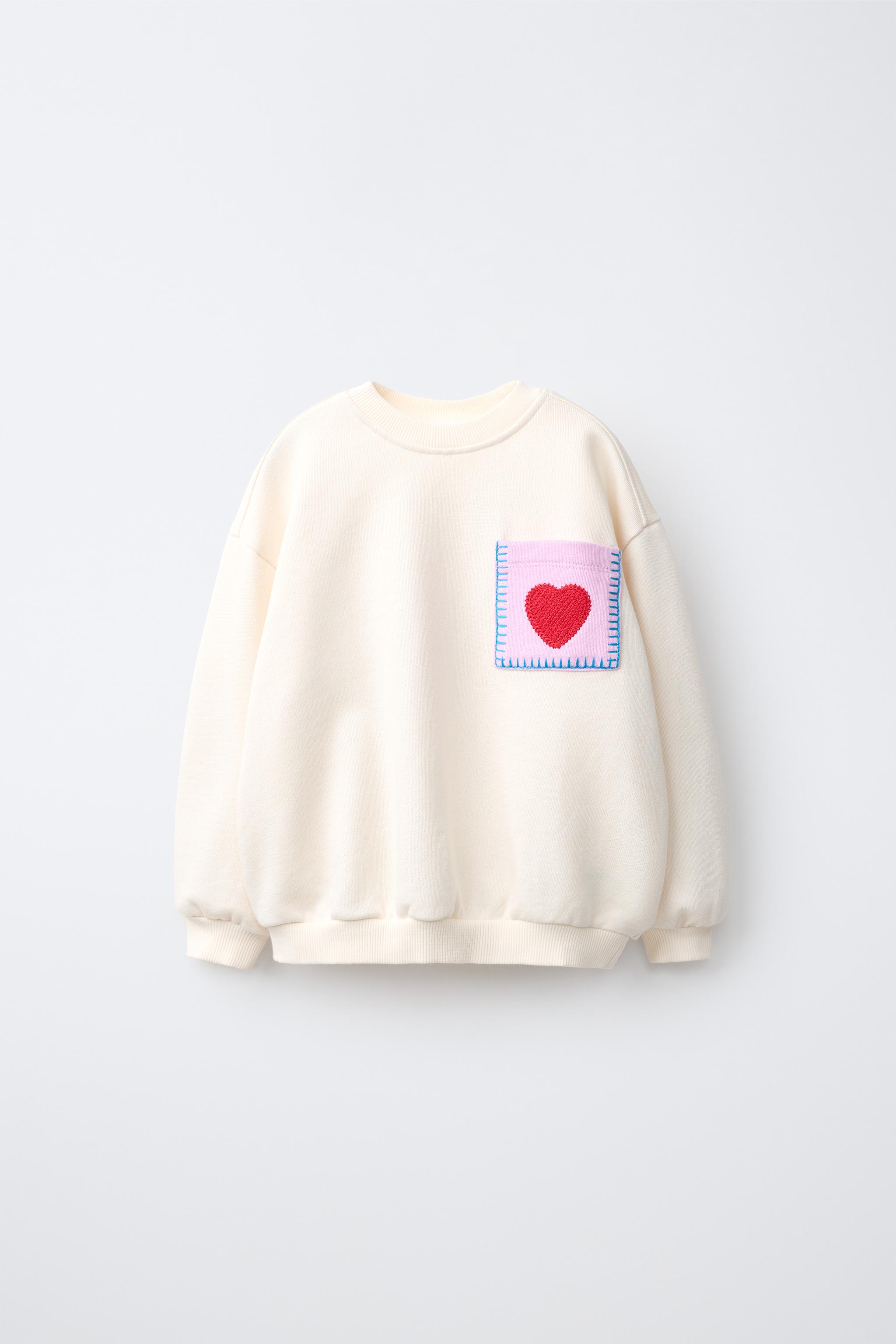 HEART POCKET SWEATSHIRT